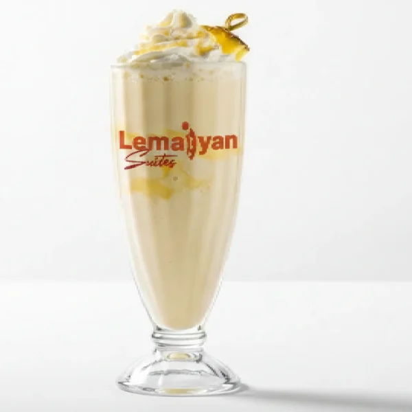 Pinacolada boozy shake-malibu,rum,pineapple j,vanilla ice cream